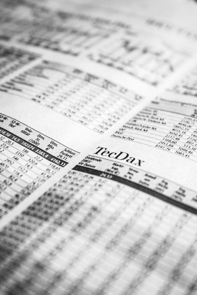 Why I’m Still Bullish on Bloom Energy (NYSE: BE) Close-up of a printed stock market report in black and white, highlighting stock prices.